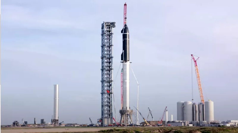 Starship au sommet du Super Heavy - Crédit : SpaceX